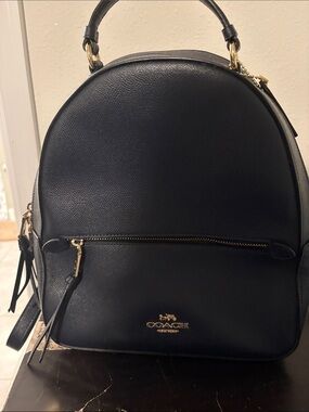 COACH Black Leather Dome Backpack with Gold Hardware